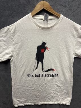 MONTY PYTHON'S HOLY GRAIL TIS BUT A SCRATCH Small White GRAPHIC T-SHIRT